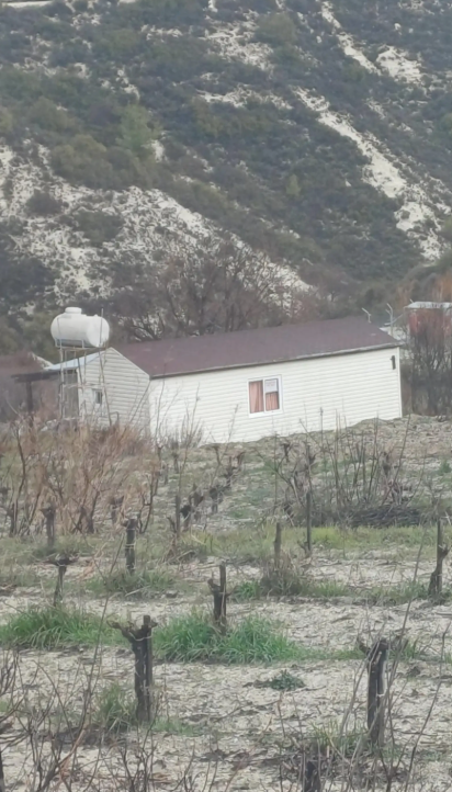 Field with House in Omodos image 2