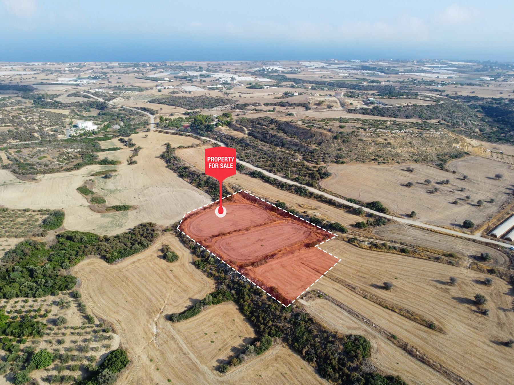 Field for sale, Maroni